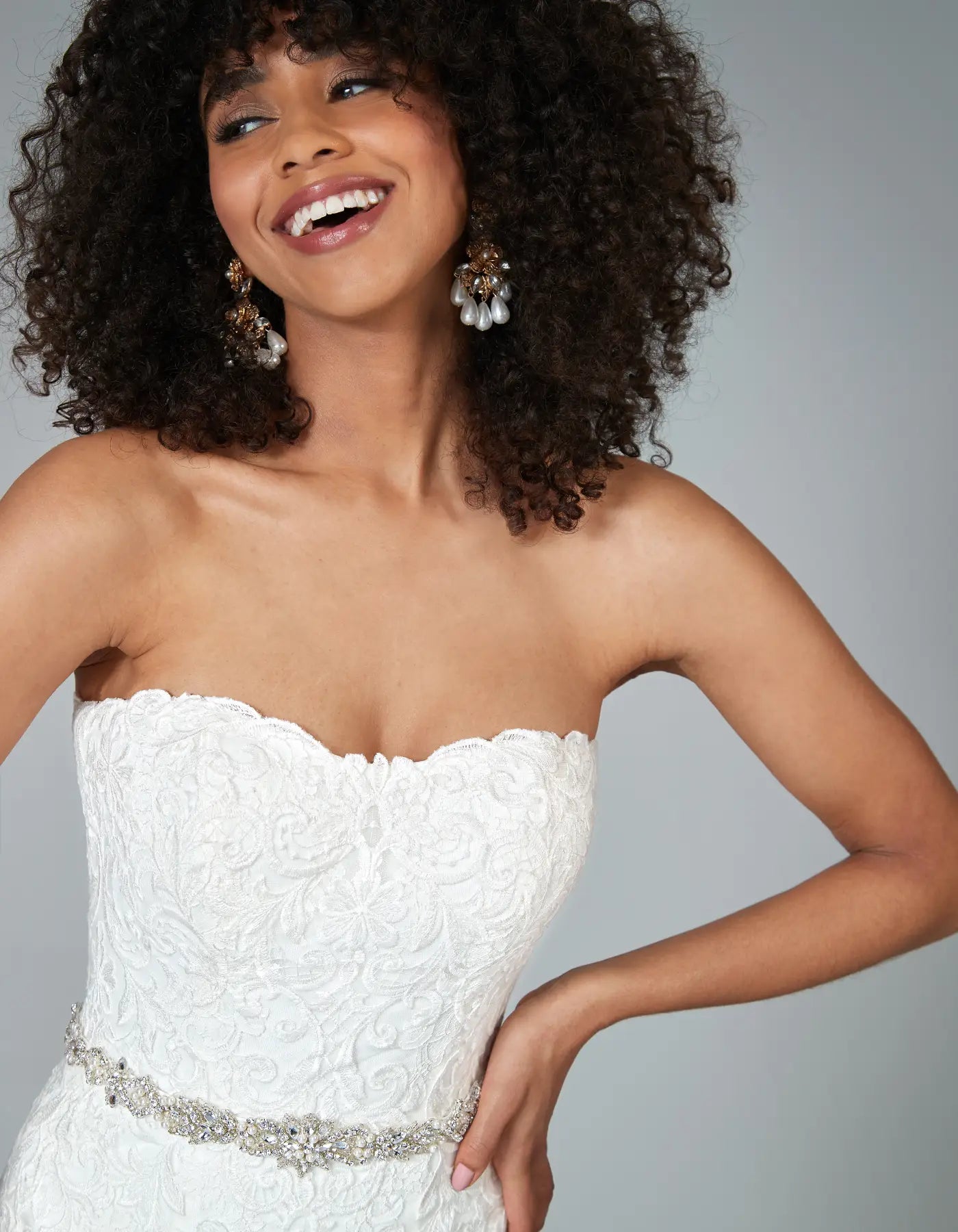AerbaDress a traditional strapless gown with ornate lace Wedding Dresses