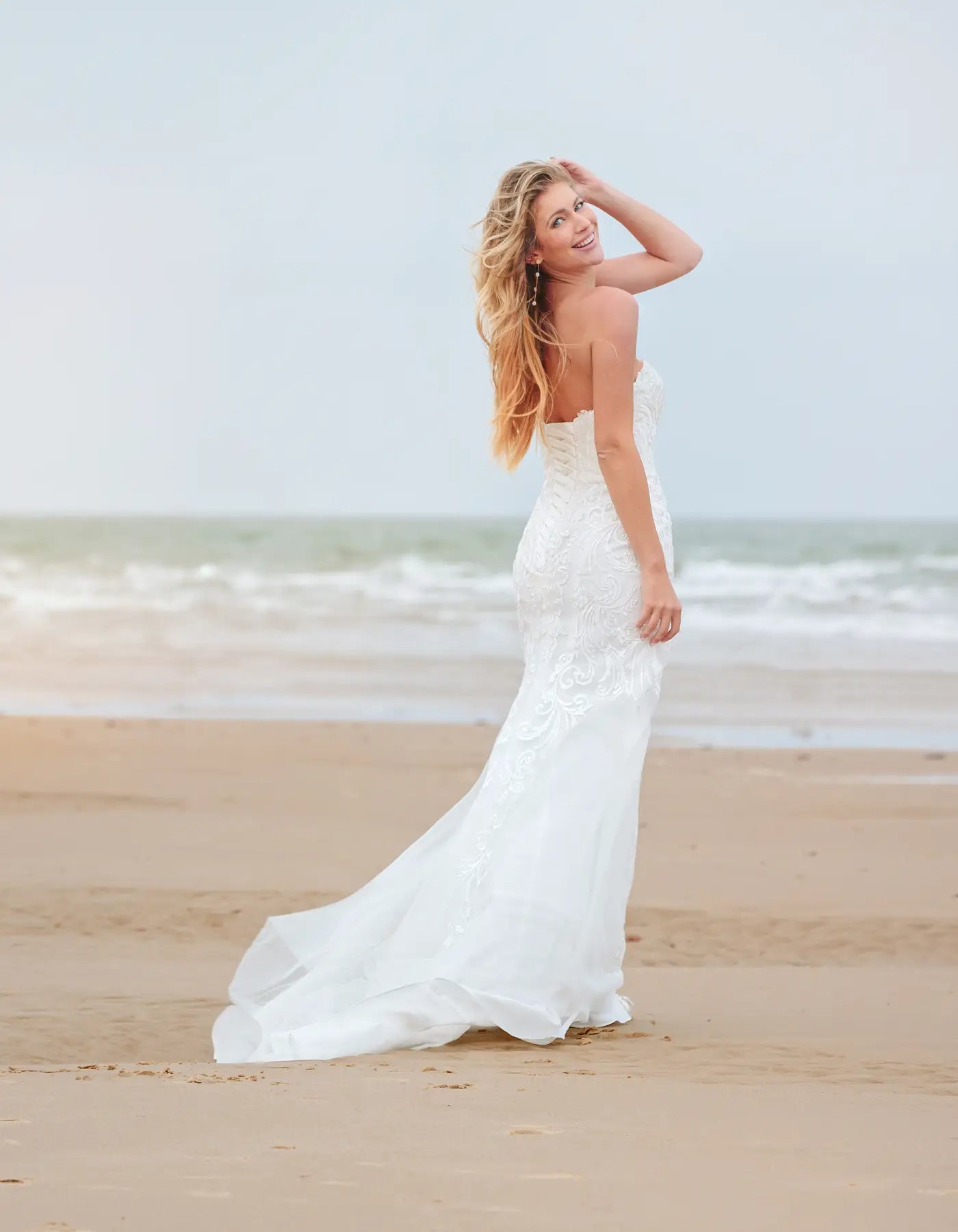 AerbaDress a statement lace sheath gown Wedding Dresses