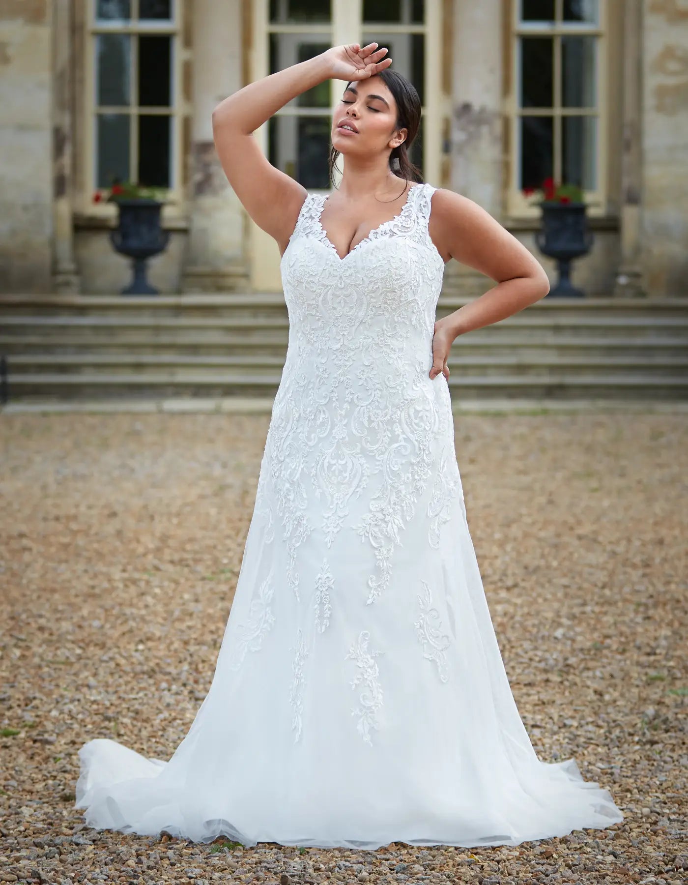 AerbaDress a traditional lace gown with illusion straps Wedding Dresses