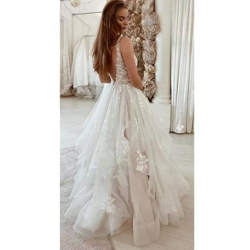 A-Line/Princess Tulle V-neck Sleeveless Applique Floor-Length Wedding Dresses