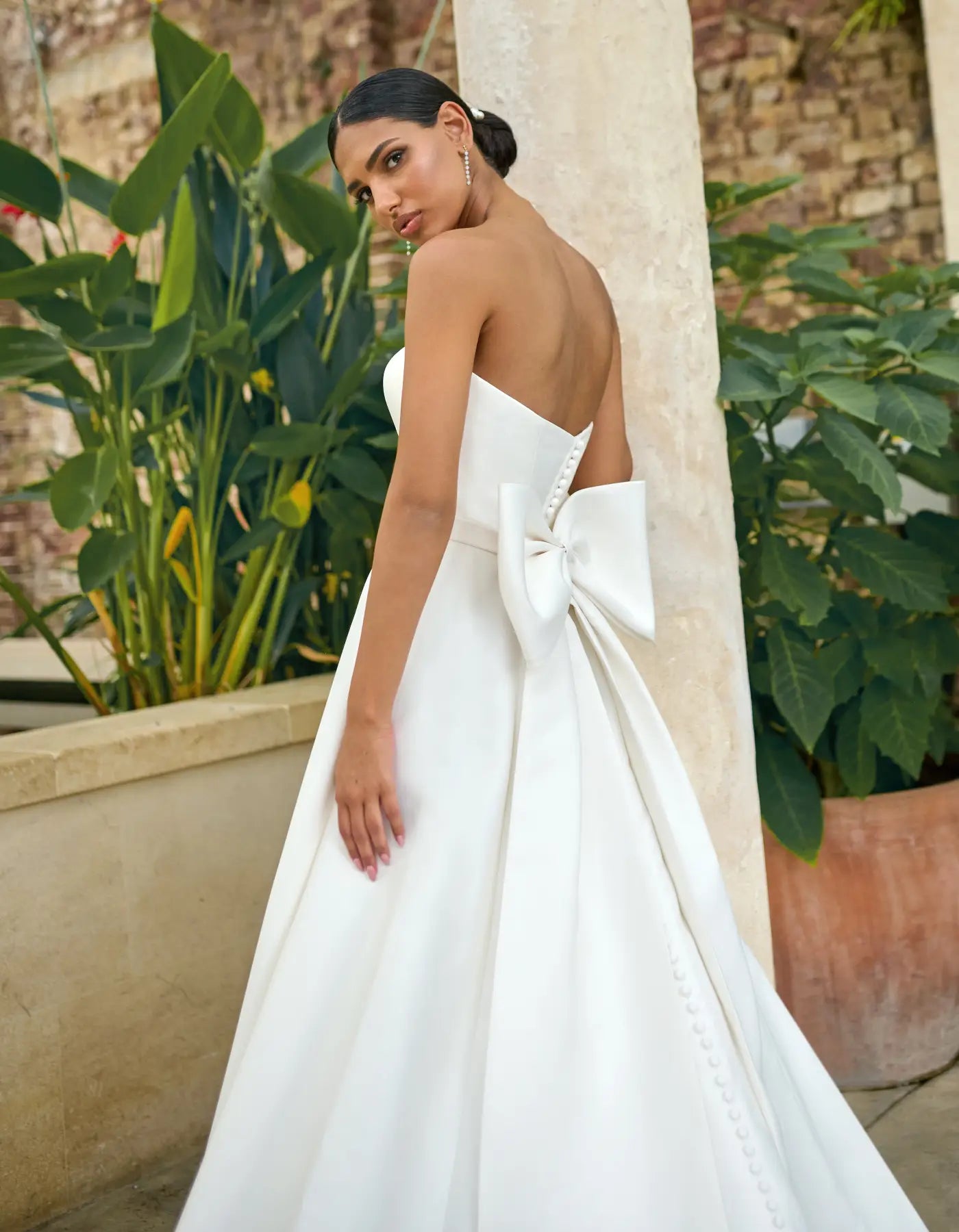 a simple wedding dress with bow