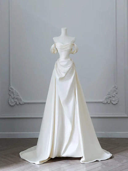 Elegant A-Line Off-the-Shoulder Sleeveless Beaded Ivory Satin Wedding Dresses