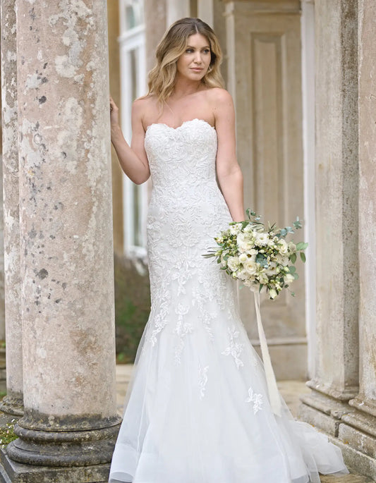 a lace mermaid wedding dress