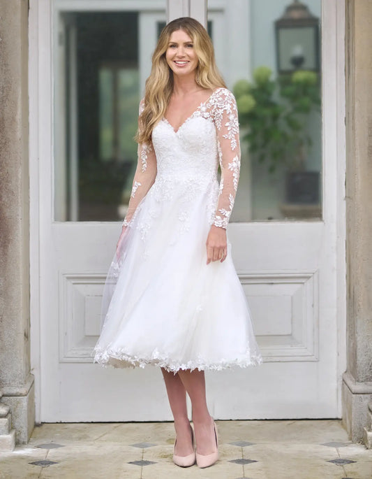 a short wedding dress with sleeves