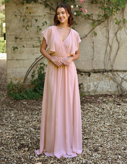 a modern draped bodice with lightweight angel sleeves