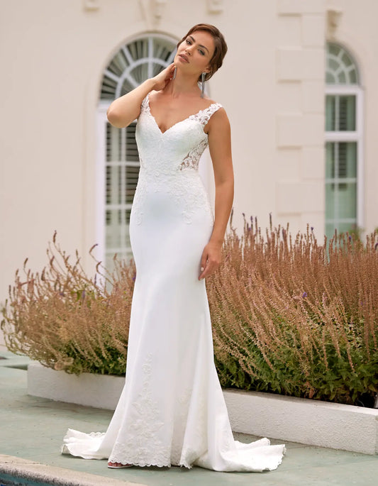 AerbaDress a sheath of lace and crepe with cut-out details